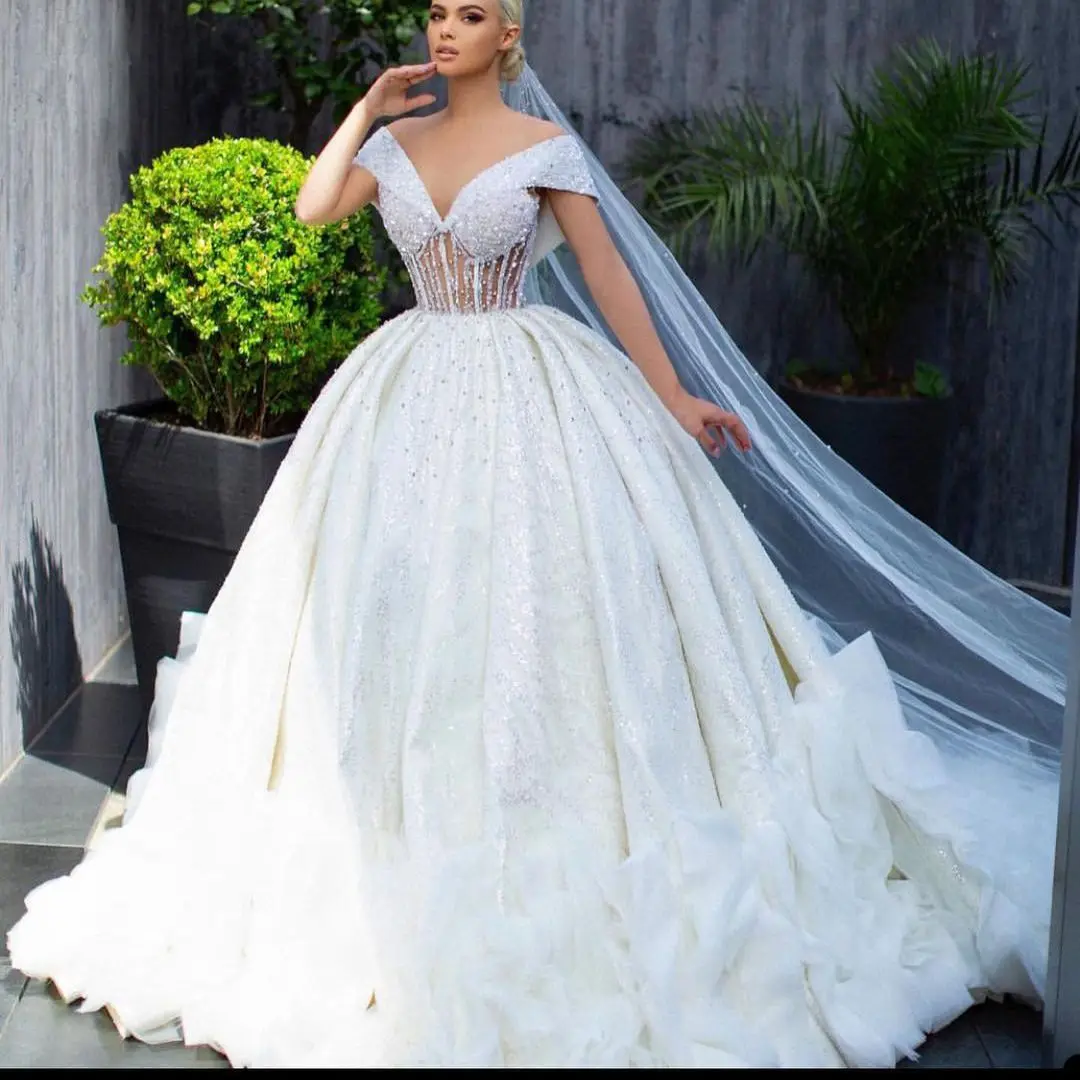 

Crystal Dubai Arabic Wedding Dresses Pearls Beads Appliques Lace Bridal Gowns Custom Made Backless Sweep Train Robes De Mariée