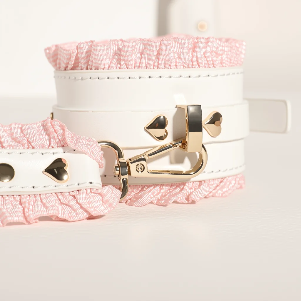Close-up of gold-tone hooks, chain detail, and smooth strap construction