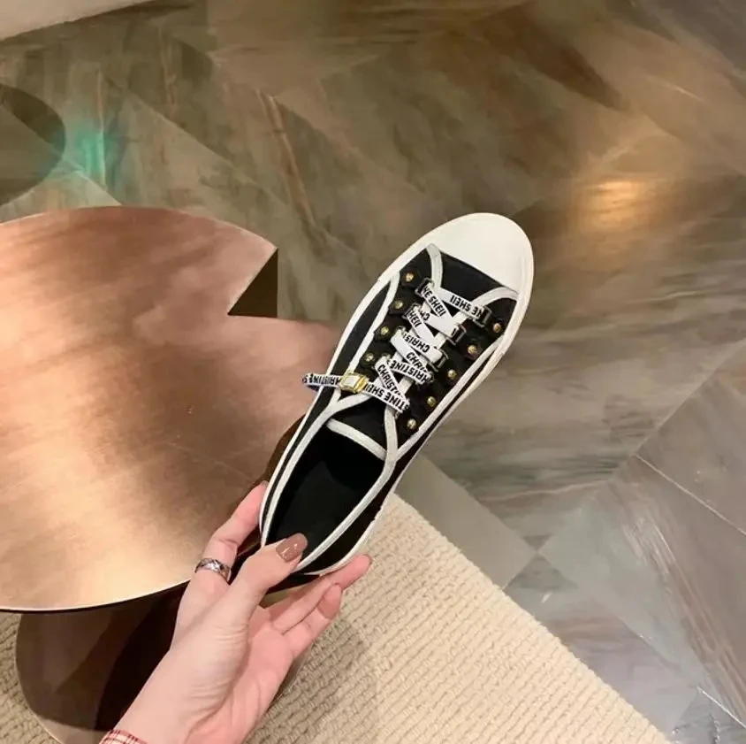 2024 new female designer brand letters casual sports thick bottom small white shoes female canvas board shoes.