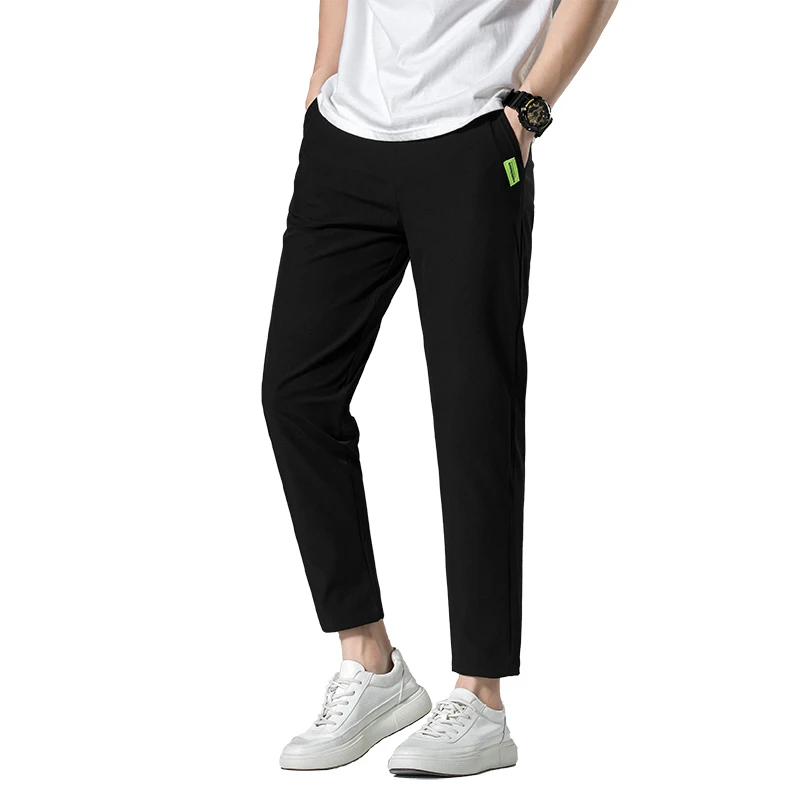 Men's Spring Autumn Elastic Casual High Waist Solid Pockets Letter Patch Casual Harlan Feet Trousers Cargo Office Lady Pants