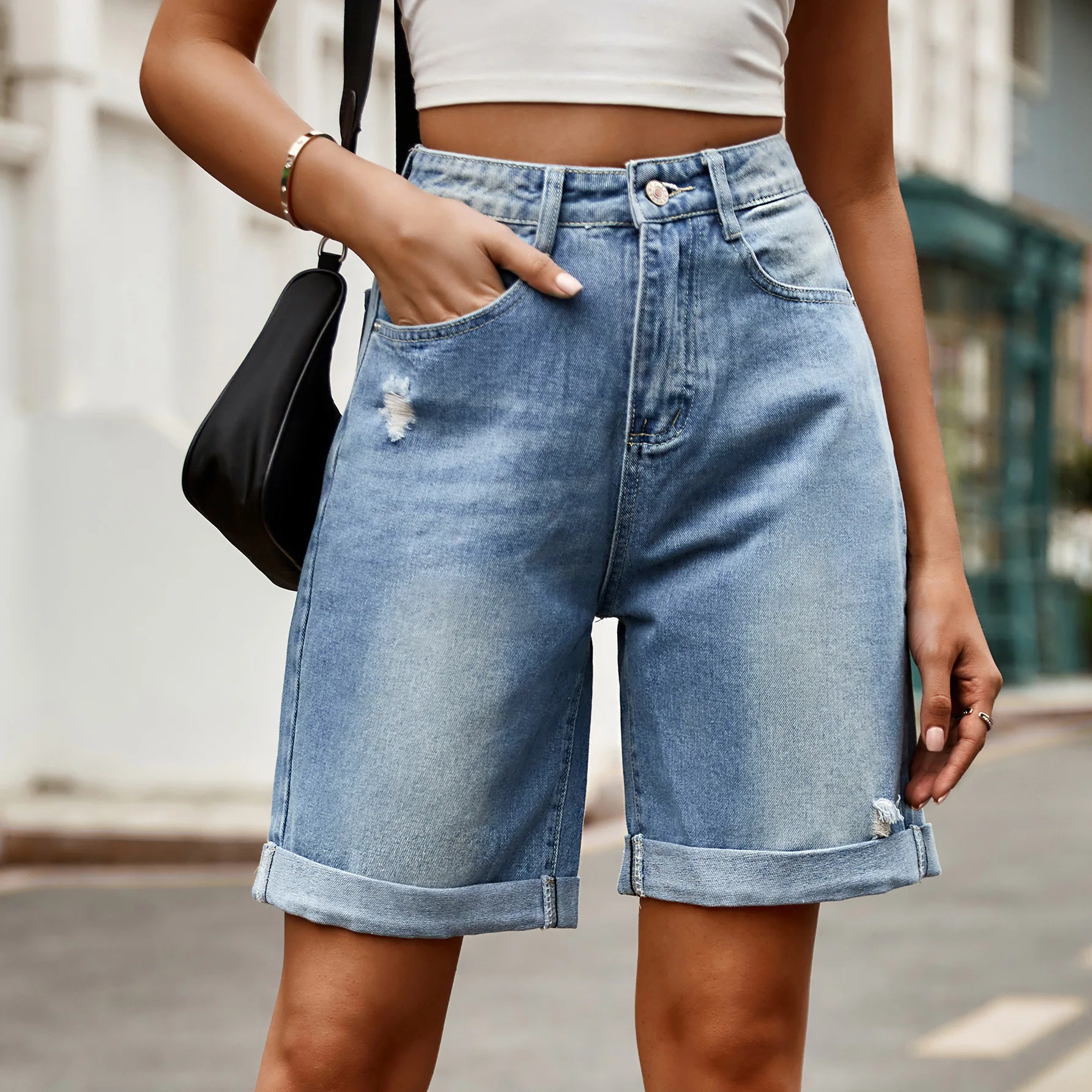 

Women's spring and summer new ripped hem five quarter denim shorts casual pants trend