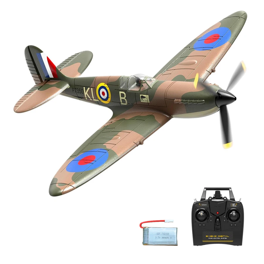 Avion RC Spitfire V1 ou V2 PNP posé sur herbe, carénage vert et hélice bipale visible, prêt à voler à 72.99€ livraison rapide