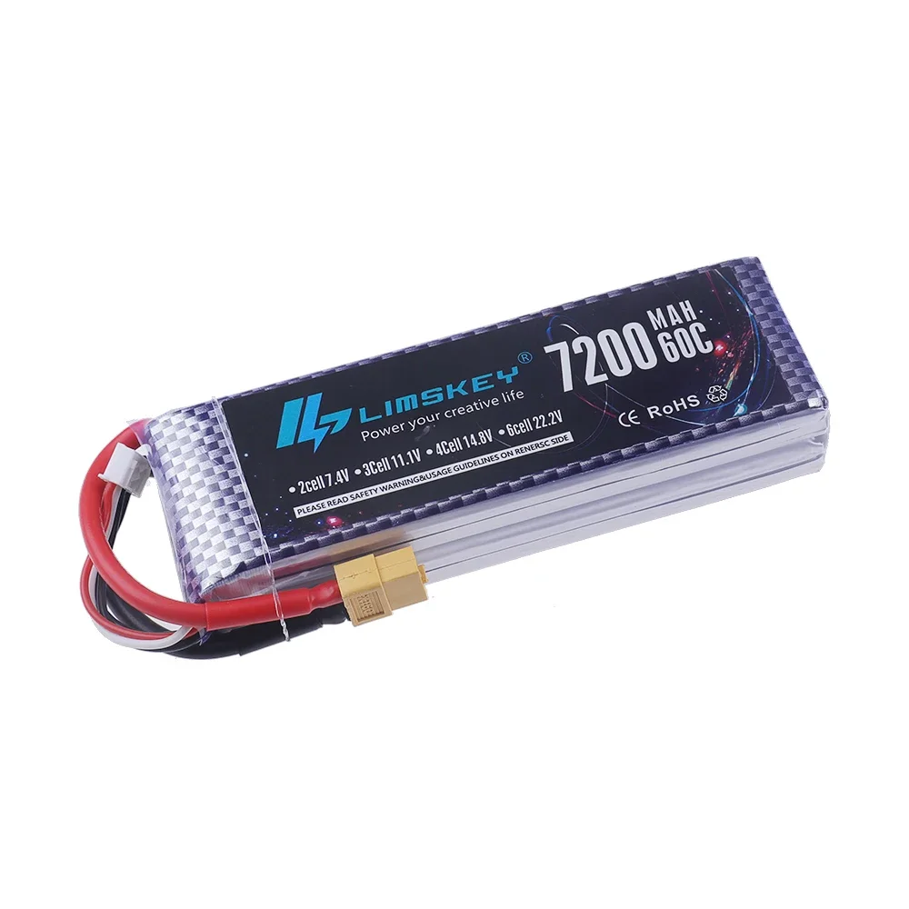 Batterie Lipo 4S 14.8V 7200mAh 60C posée à côté d'un drone FPV, parfaite pour haute décharge.