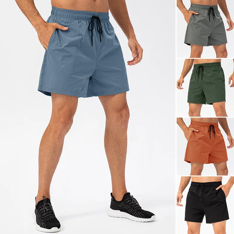 

Quick Dry Bodybuilding Jogging Sport Running Shorts Summer Male Shorts Homme Fitness Gym Short Man Breathable Workout Sweatpant