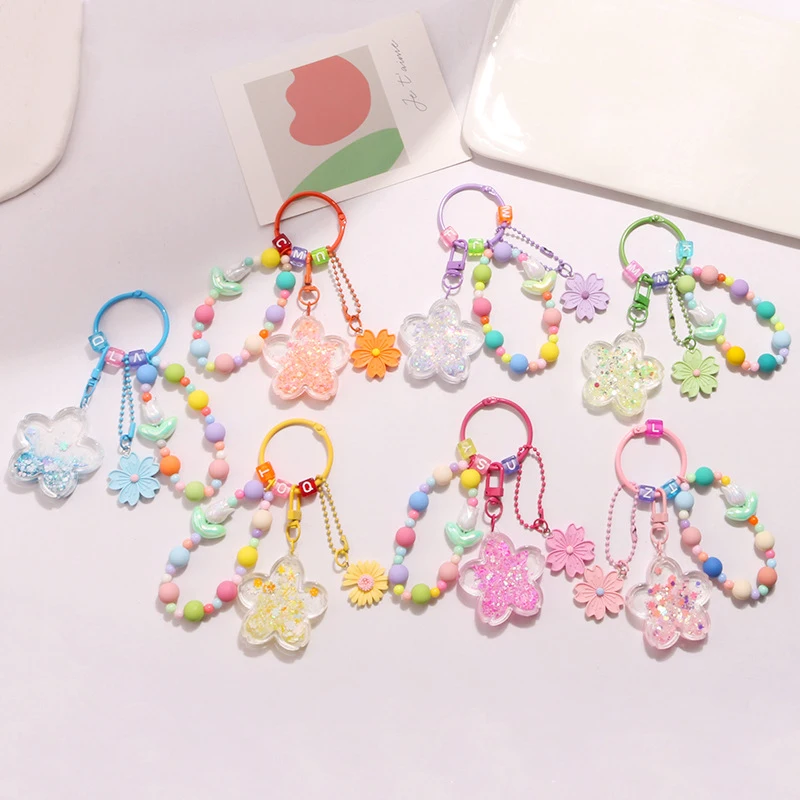 

New Oil Flowing Sand Big Flower Keychain With Cute Colorful Sakura Accessories Pendant Women Earphone Case Bag Decoration