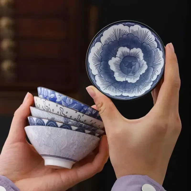Handcrafted Blue & White Porcelain Teacup - Dragon, Phoenix, and Pavilion Design