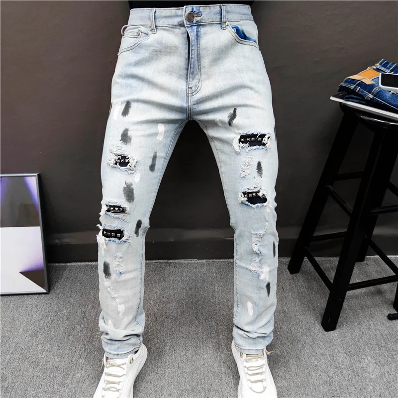 mens slim jeans Hole Blue Jean Pants Metal Rivet Patchwork Ripped Tights Jeans Men Brand European Jean Pant Men Slim Stretch Jean Denim Trousers cowboy jeans