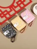 Fashionable and portable short wallet with zippered synthetic leather and ample card slots, perfect for Valentine's Day gift giv 1