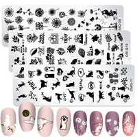 Cartoon Animals Nail Art Stamping Plates Rose Cats Butterfly Dandelion Image Printing Stencils Nail Stamp Templates Nail Tool 1