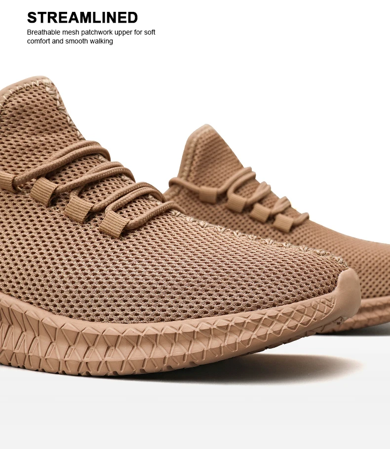 Pair of brown lace-up sneakers placed on a rocky trail, highlighting breathable mesh and thick non-slip sole