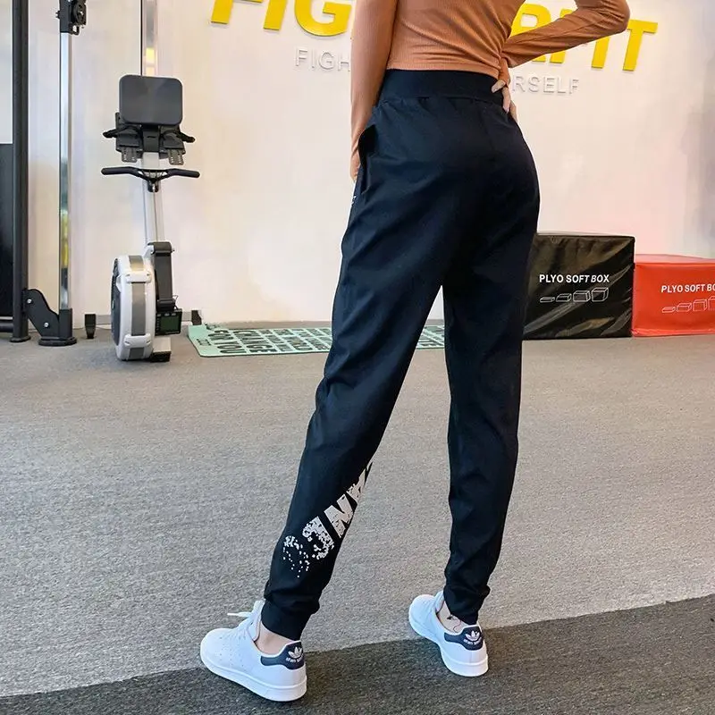 2023 Spring Autumn New Fashion Elastic Waist Pockets Printing Casual Pants Women High Street Motion Bodybuilding Running Trouser