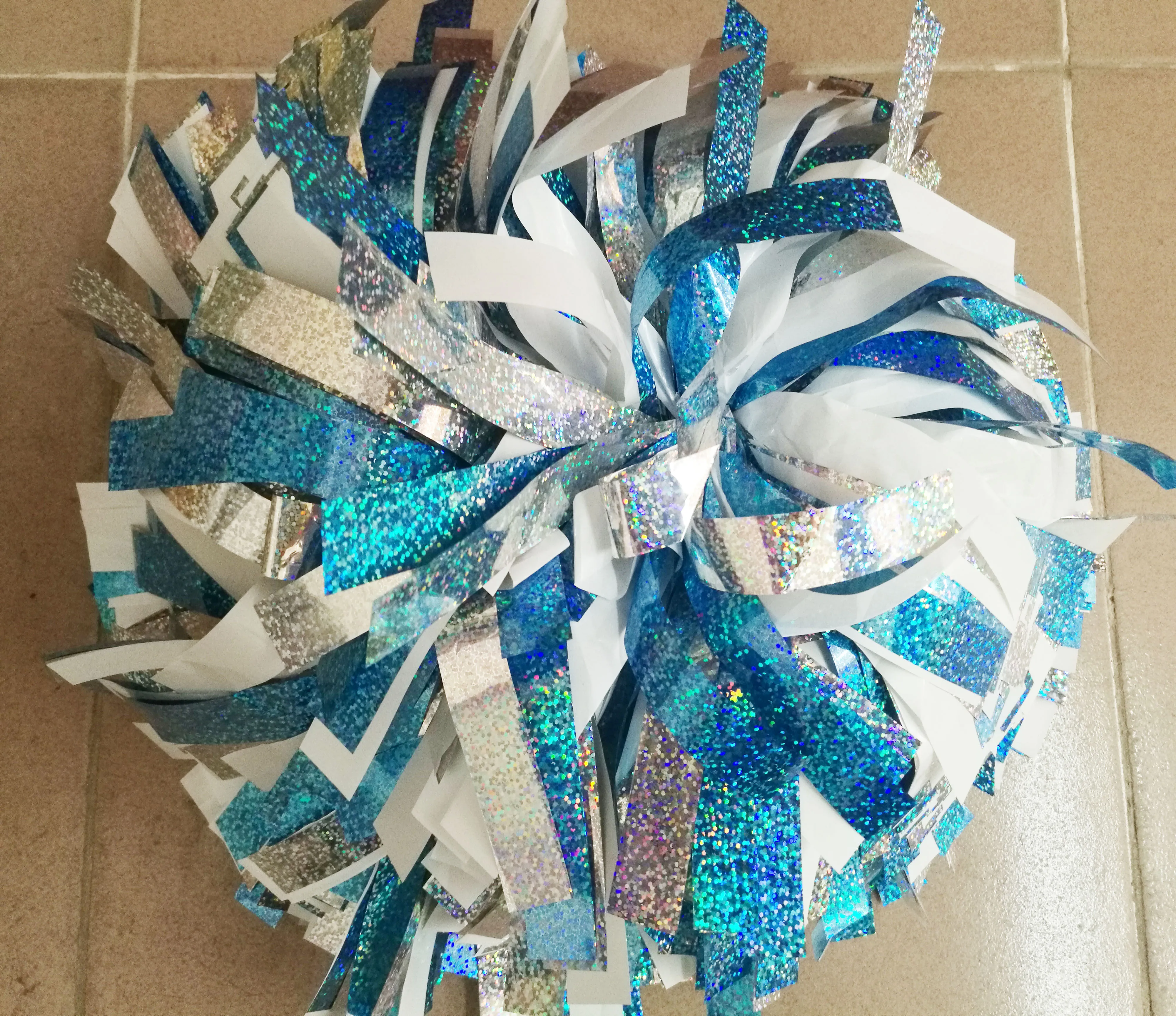 Professional Cheerleader pom pom,metallic red with silver and white,color and size.