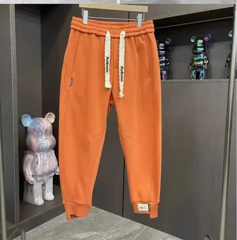 Pantaloni da uomo Nuova tendenza moda autunno/inverno Harlan Elastico in vita con coulisse Pantaloni larghi versatili sottili e belli 1