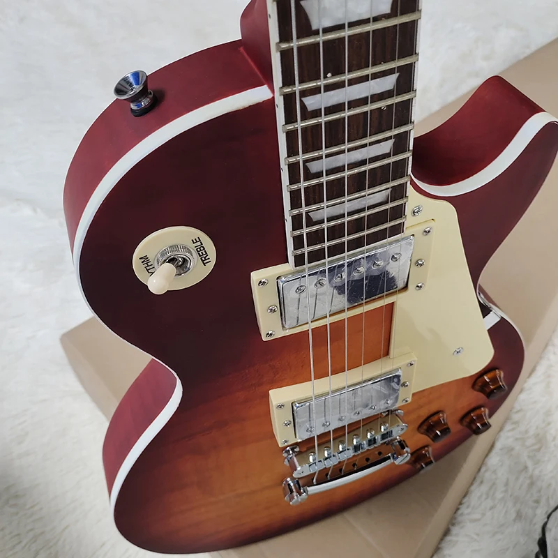 

This is a brown water ripple electric guitar with beautiful appearance and unique timbre. It is free to mail home