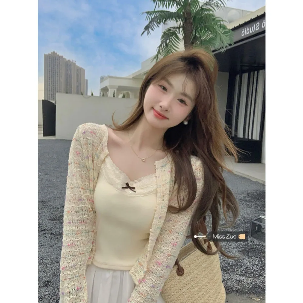 

Korean hollow thin section sunscreen knit sweater female summer 2024 new chic loose short section long-sleeved cardigan blouse