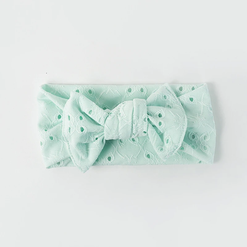 Рисунок 6 - Повязка на голову с бантом для девочек