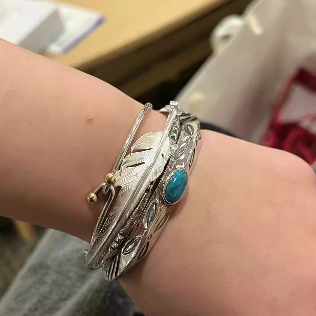 Larry sm1th wind cut feather bracelet