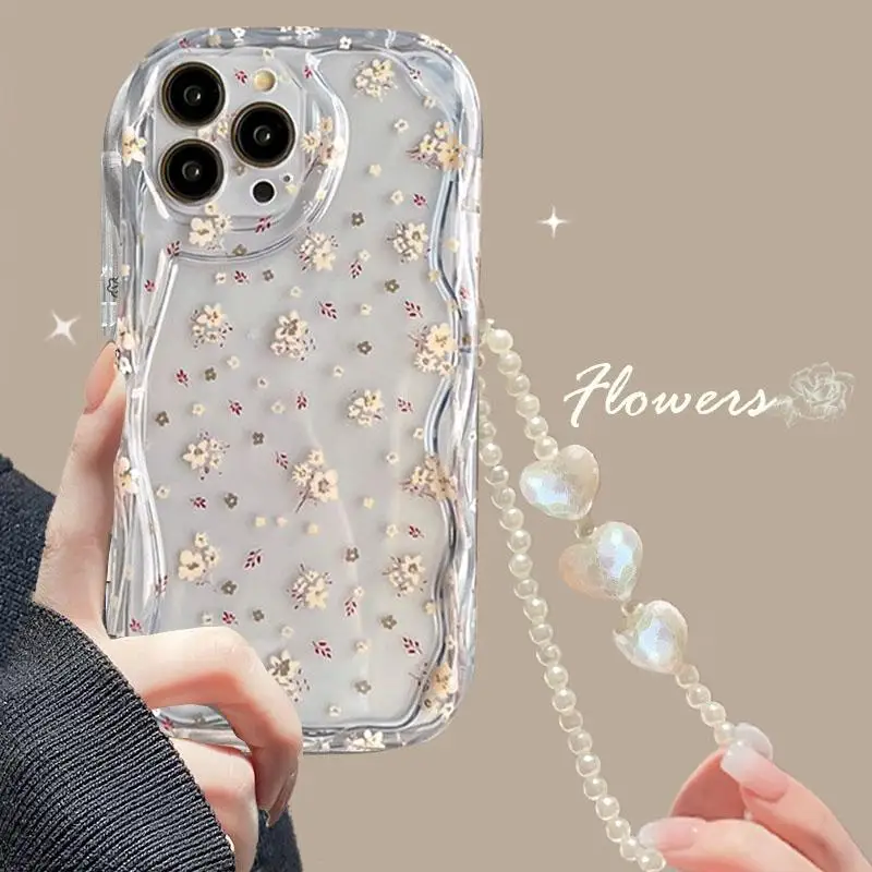 Transparent silicone phone case with cartoon butterfly design and heart bracelet showing full camera protection.