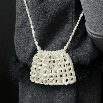 Borsa a tracolla artigianale con perline, piccola borsa, mini borsa porta cuffie alla moda con intaglio, bustina portatile versatile e casual