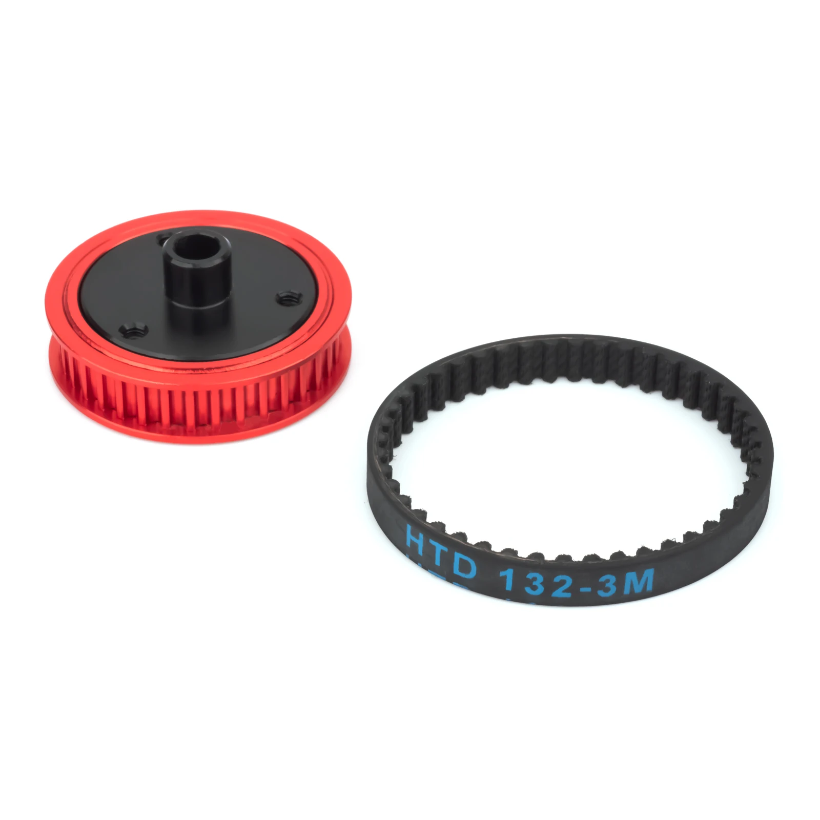 Moteur brushless RC posé sur fond noir, mettant en valeur son boîtier métallique et son axe de sortie