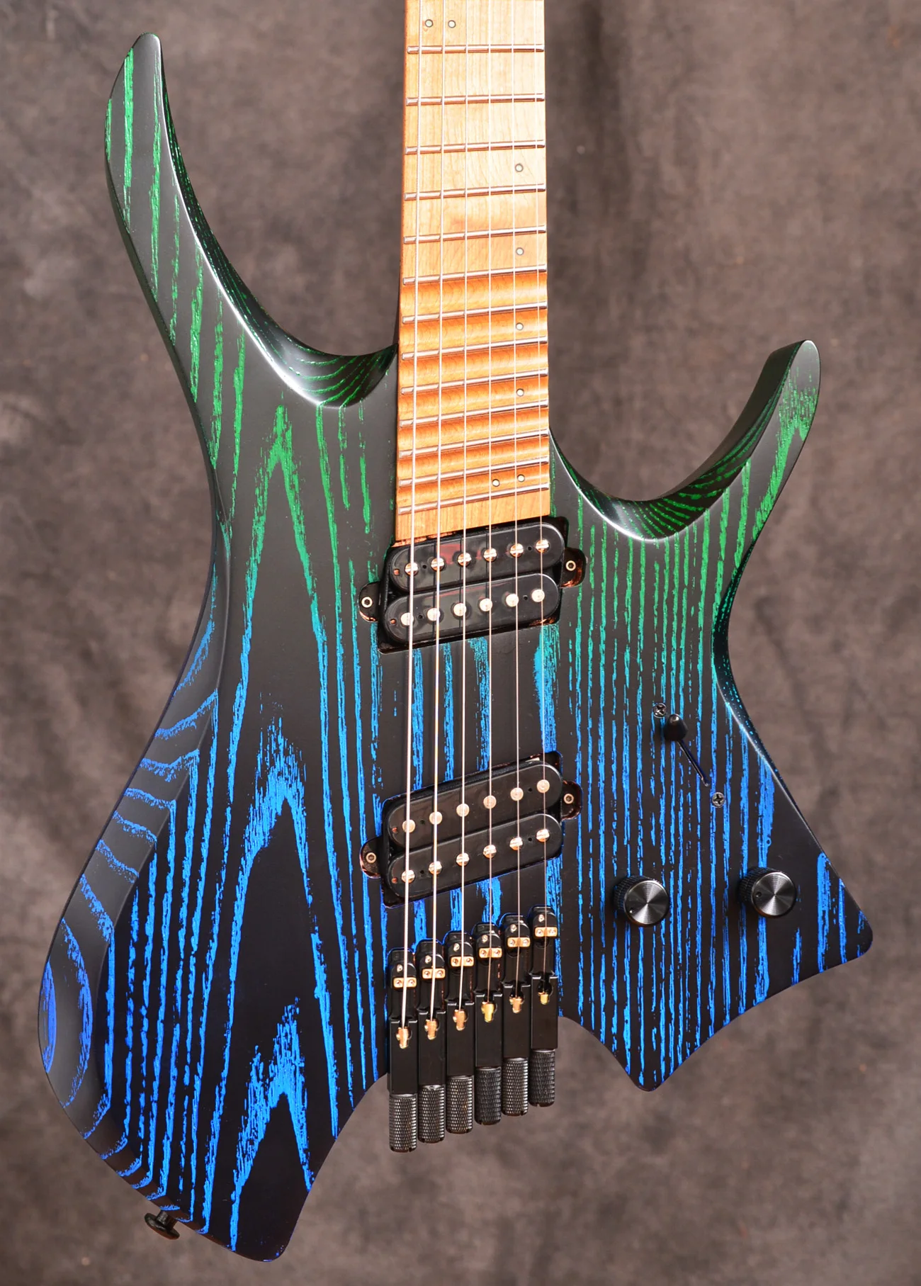 

Blue-green fan-shaped headless electric guitar AMP bridge tiger pattern neck finger board luminous side note