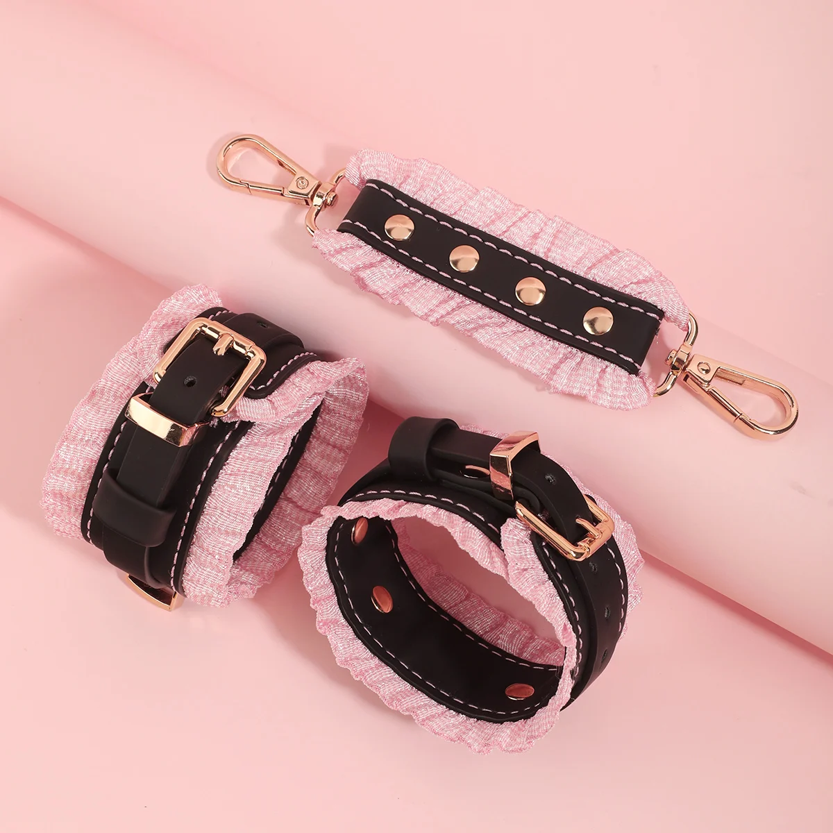 Matching adult accessories shown on a light display background Bondage Restraint Set