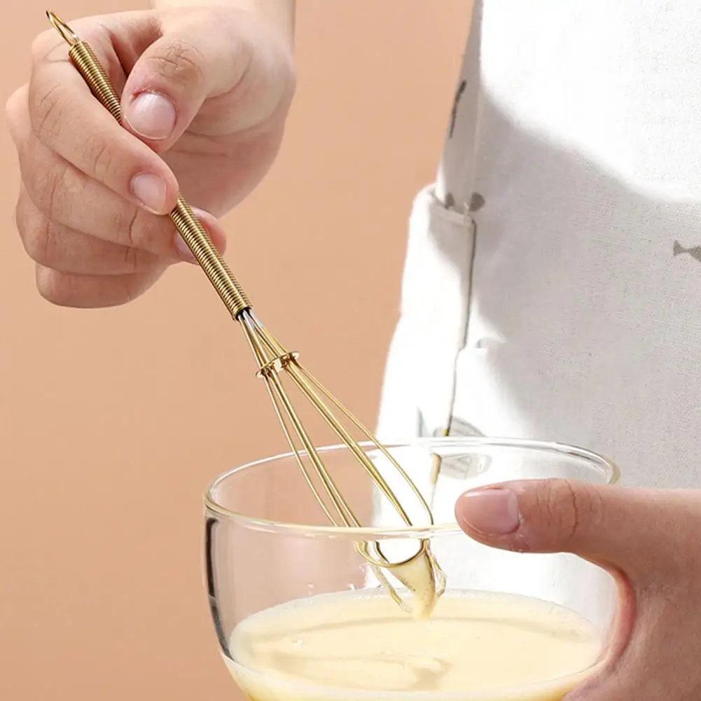 https://ae01.alicdn.com/kf/S306b3444592342c88df0e8bc31dd7703T/Stainless-Steel-Mini-Size-Egg-Beater-Hand-Whisk-Gold-Multifunctional-Mixer-Baking-Cake-Tool-Egg-Mixer.jpg