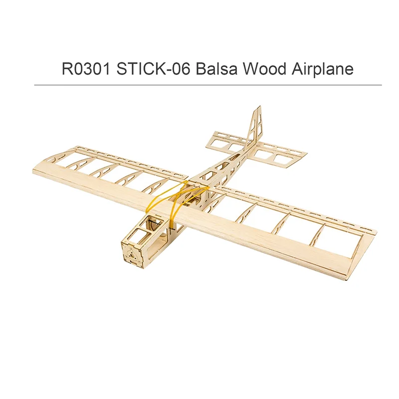 Moteur brushless et hélice du kit avion RC balsa 580mm, vue rapprochée des composants électroniques.