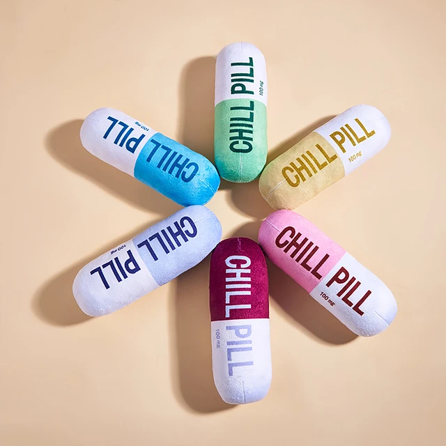 Interactive Plush Pill-Shaped Dog Toy with Squeaker - Durable, Bite-Resistant Chew Toy for Pet Play and Dental Health 3