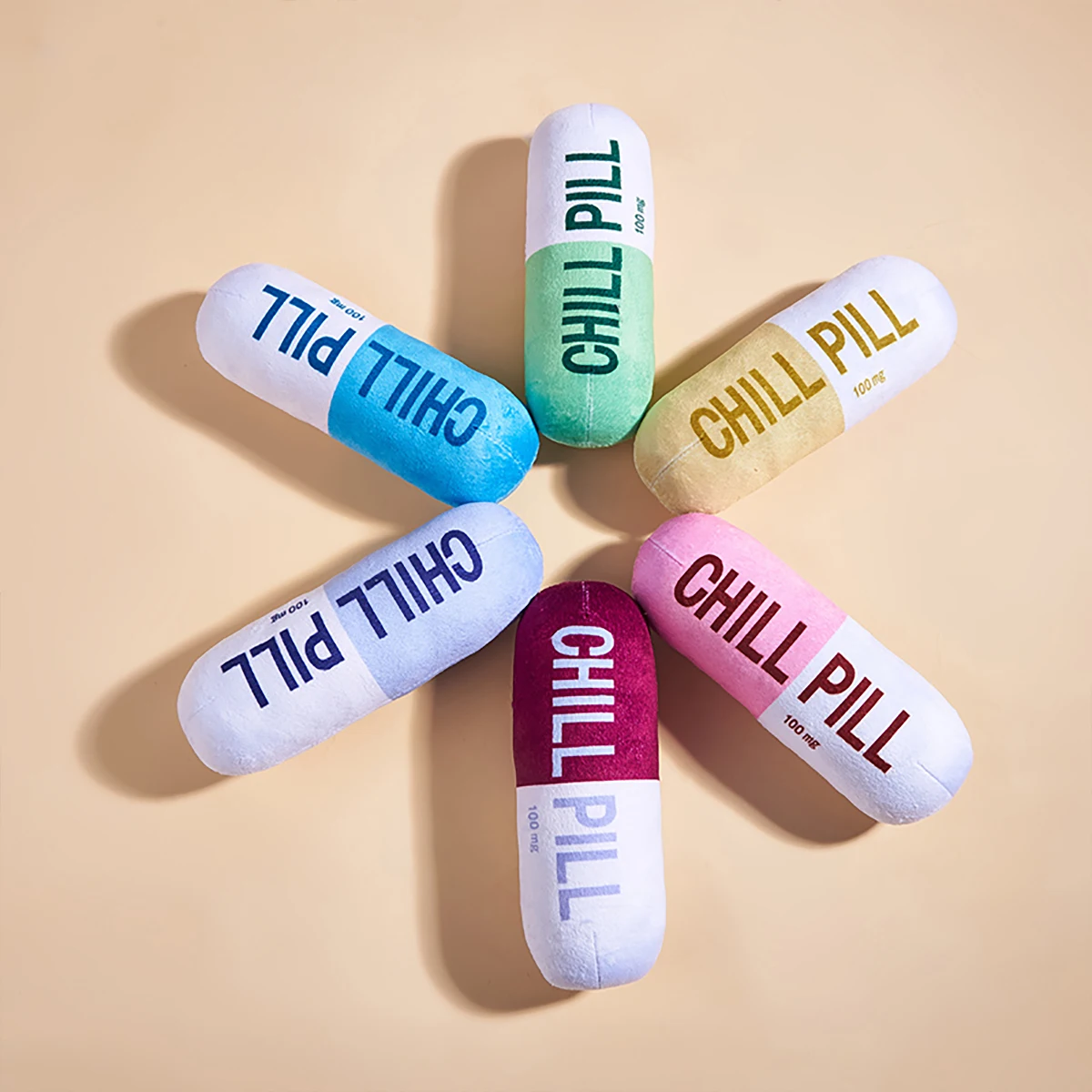 Interactive Plush Pill-Shaped Dog Toy with Squeaker - Durable, Bite-Resistant Chew Toy for Pet Play and Dental Health 3
