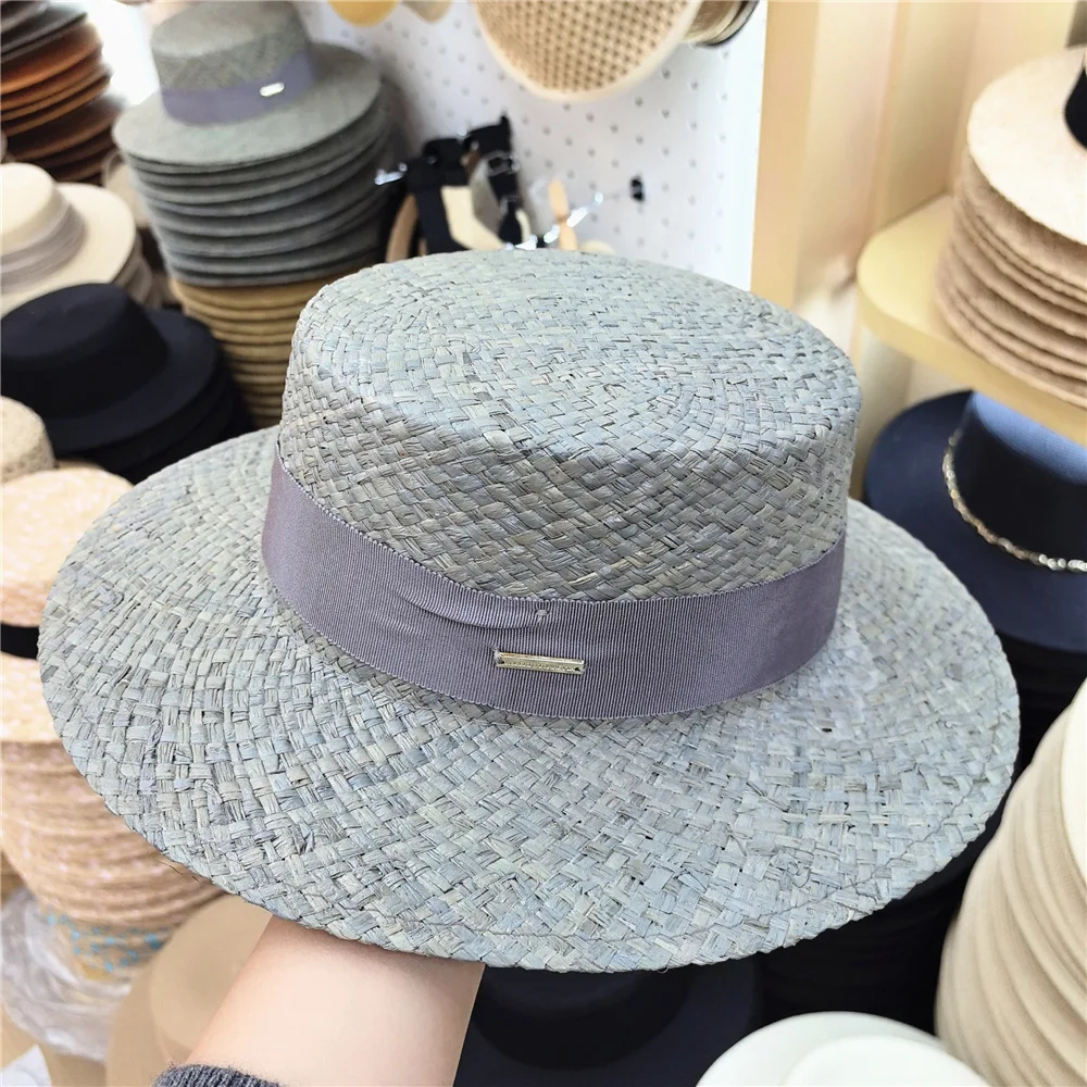 

The new hand-woven Lafite straw hat fashion casual street shooting tide hat men and women with outdoor travel sunscreen jazz hat