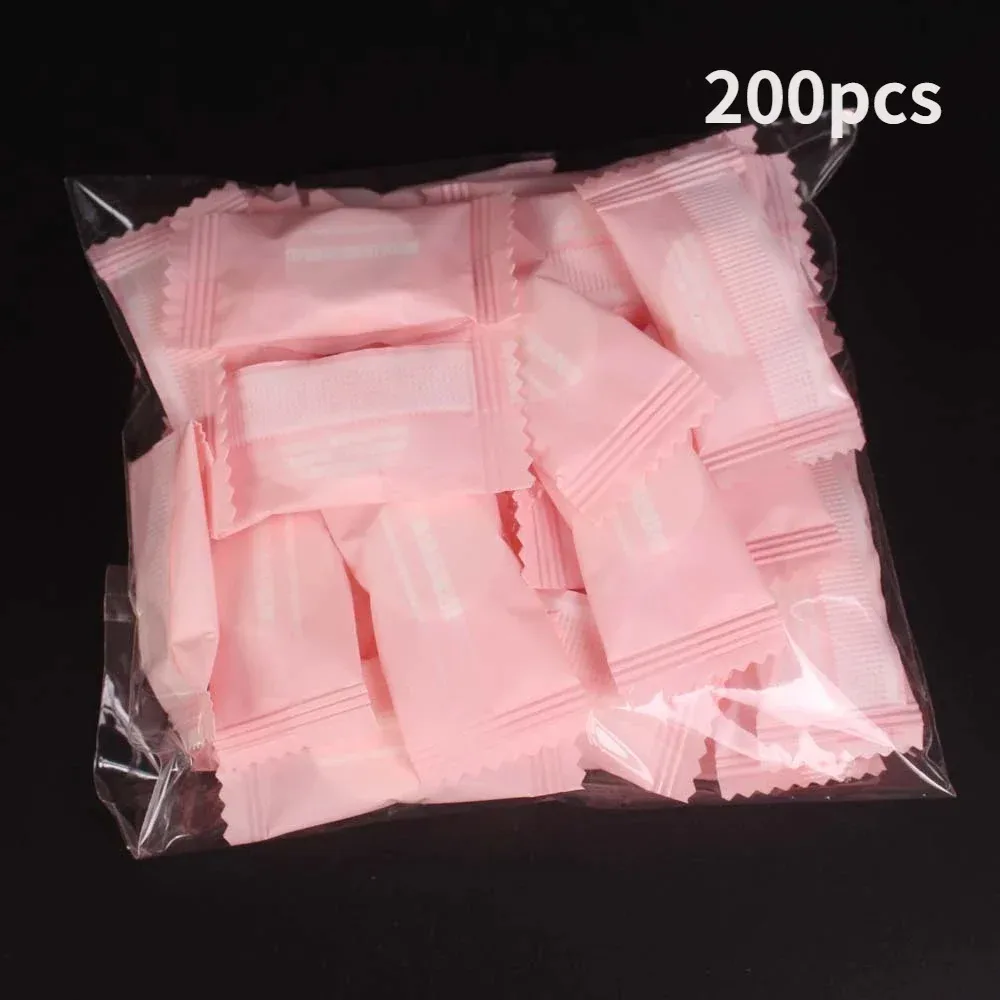 Description Picture 2 of item100pcs Mini Compressed Towel Disposable Capsules Towel Magic Face Care Tablet Outdoor Travel Cloth Wipes Paper Tissue Mask