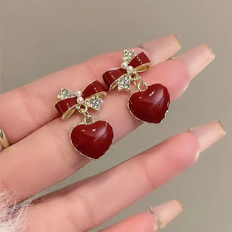 

Korean Fashion Style Earrings Wine Red Drop Glazed Love Bow Crystal Earrings New Style Versatile Women's Jewelry Birthday Gift