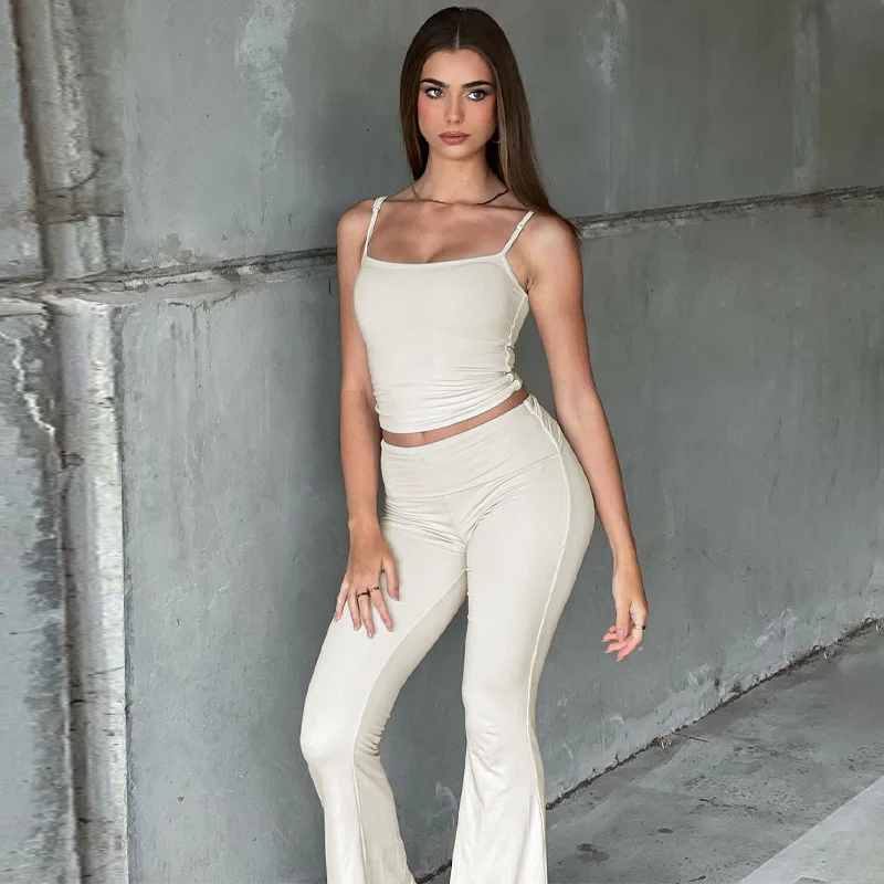 

Летний Новый Модный облегающий Женский комплект, соблазнительный однотонный короткий топ на бретелях и расклешенные брюки с эластичным поясом, комплект из двух предметов