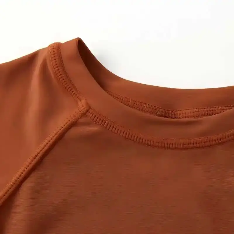 Boys' long-sleeved split swimsuit and swimming cap set