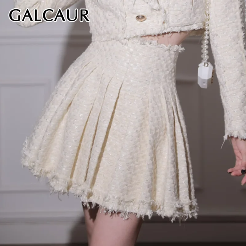 

Мини-юбка женская однотонная плиссированная трапециевидная с высокой талией и кисточками