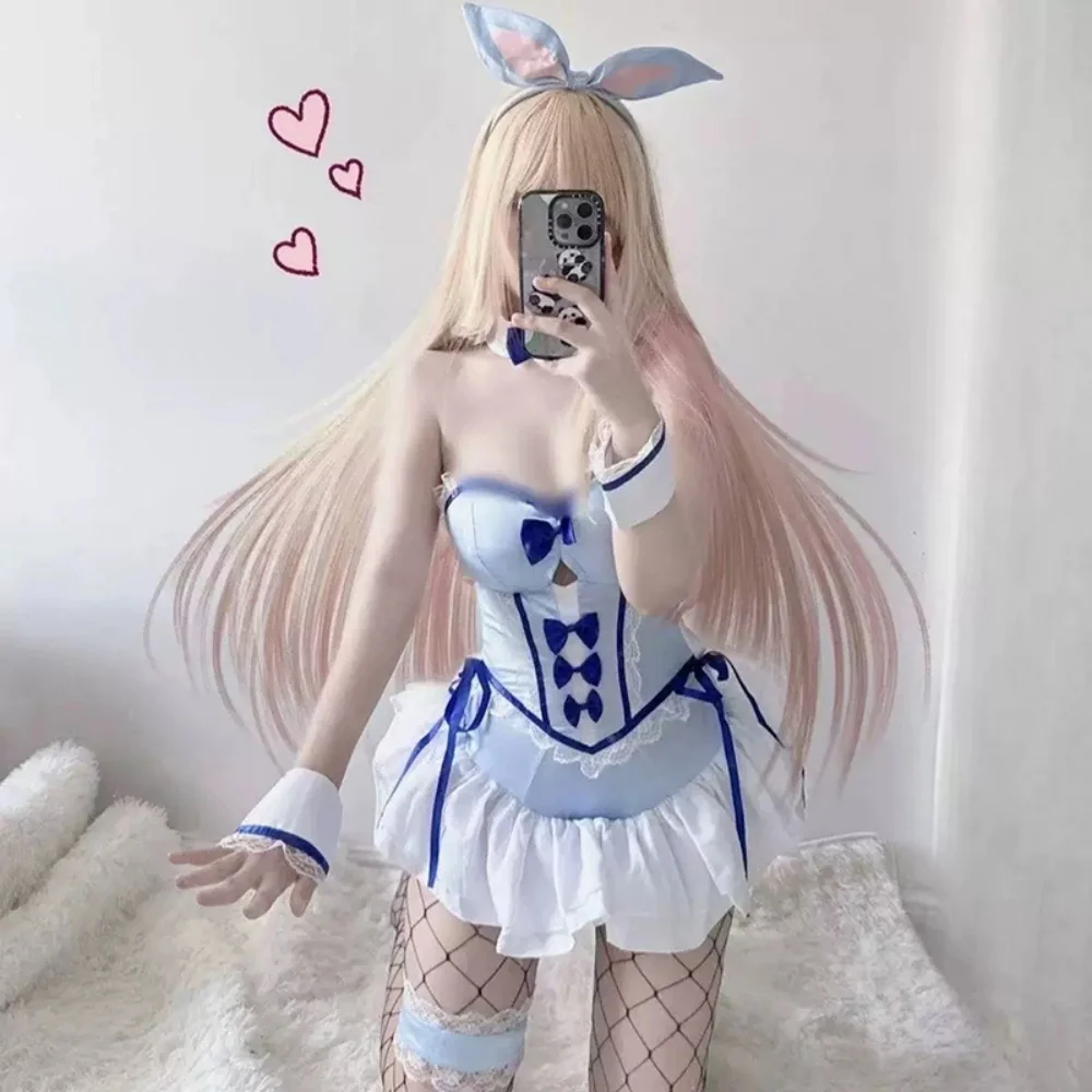 Anime cosplay outfit with blue dress, white ruffle trim, and playful bunny ear headpiece