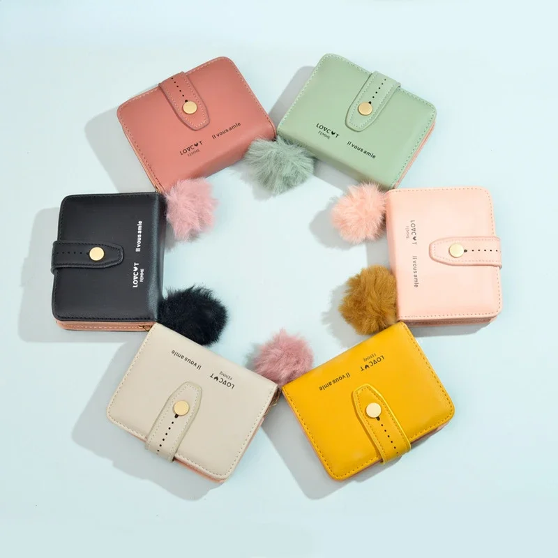 

Wallet Explosive Women's Short Wallet Multi-card Solid Color Hairball Change Clip Belt Decoration Large Capacity