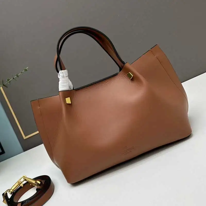 

Designer vintage riveted cowhide large capacity handbag Women's new shopping bag Fashion luxury multi-functional Tote bag
