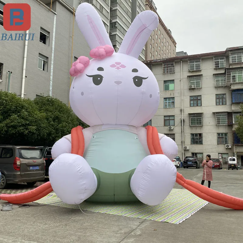 

Cartoon inflatable sitting rabbit air model pink cherry blossom rabbit headdress ancient Tang Dynasty mid-autumn Festival