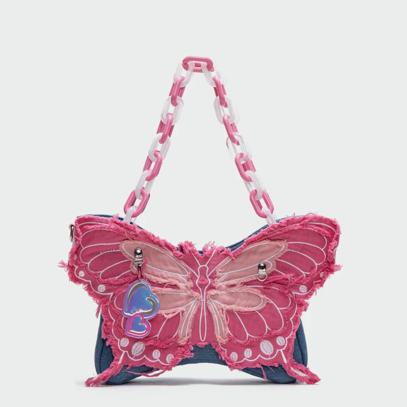 

Denim Butterfly Contrast Pain Pack acrylic chain slung over one shoulder.