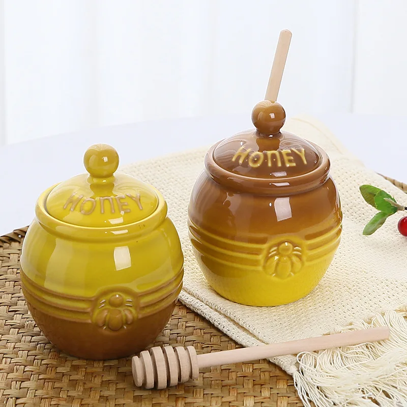 Gradient yellow and brown porcelain honey storage container for kitchen decor.
