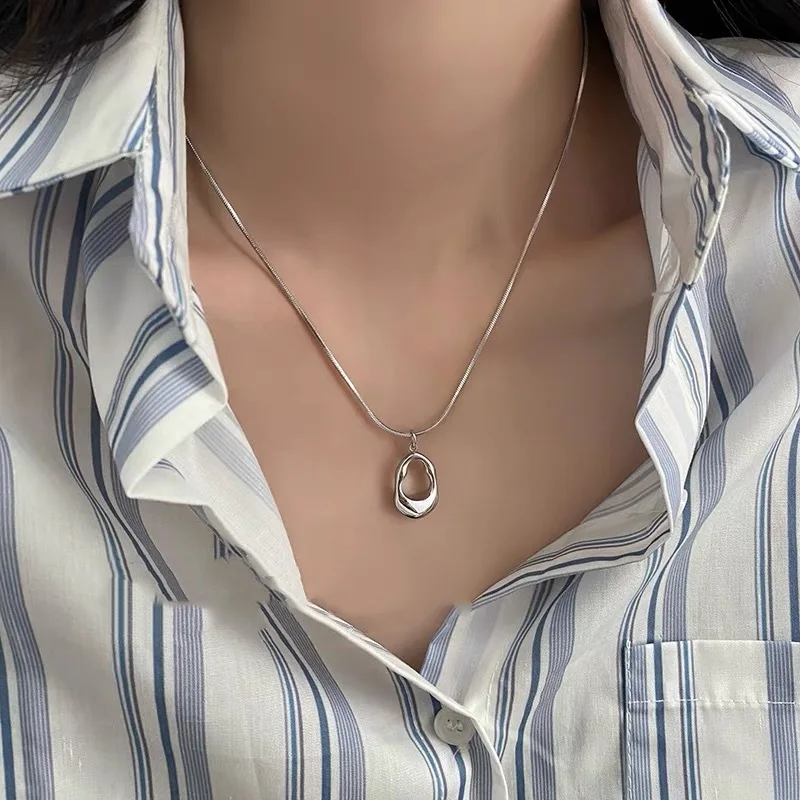 2025 New Trendy Silver Color Hollow Water Drop Pendant
