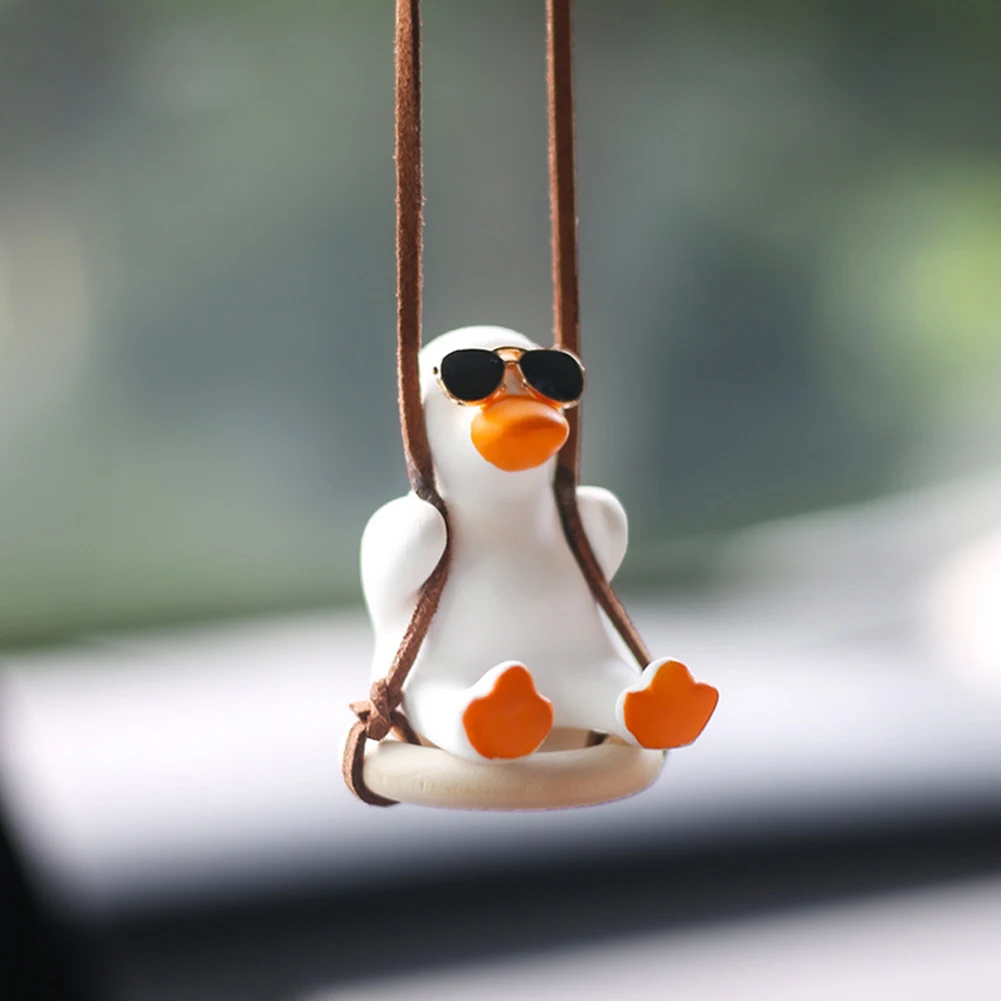 Gips Kühlen Weiß Schaukel Ente mit Sonnenbrille Automoblie Decor Auto  Rückspiegel Ornamente Kreative Ente Auto Dekoration - AliExpress