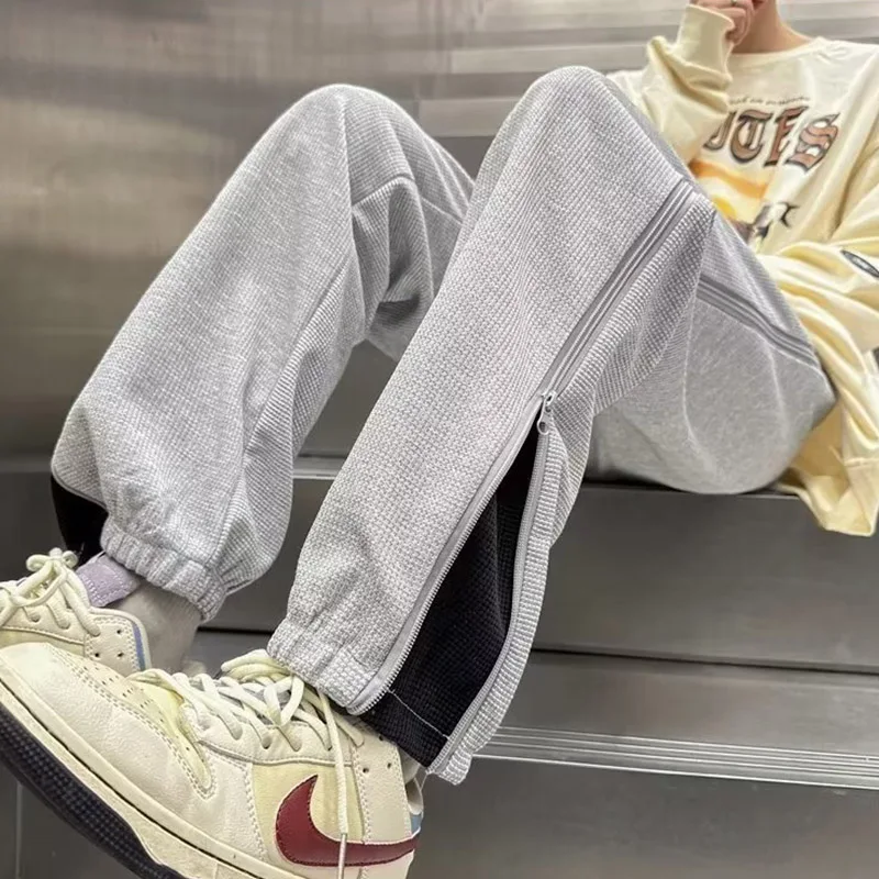 New Spring Checkered Pant Hem Zipper Split Large Size Trendy Travel Luxury Design For Men And Women With Strap Feet Casual Pants