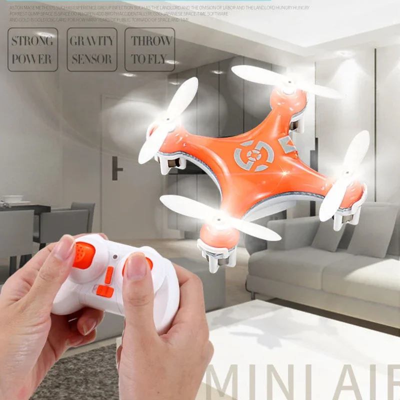 Drone plie rouge en vol, capturant des images HD, idéal pour débutants.