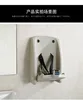 Y  The third bathroom care desk is wall mounted, with a children's diaper changing table and a foldable bathroom safety chair 3
