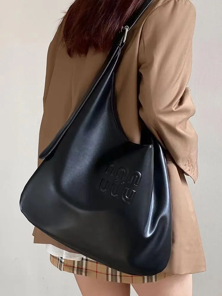 

Вместительная сумка-тоут из мягкой кожи для женщин, новинка 2024, черная высококачественная повседневная сумка через плечо для поездок