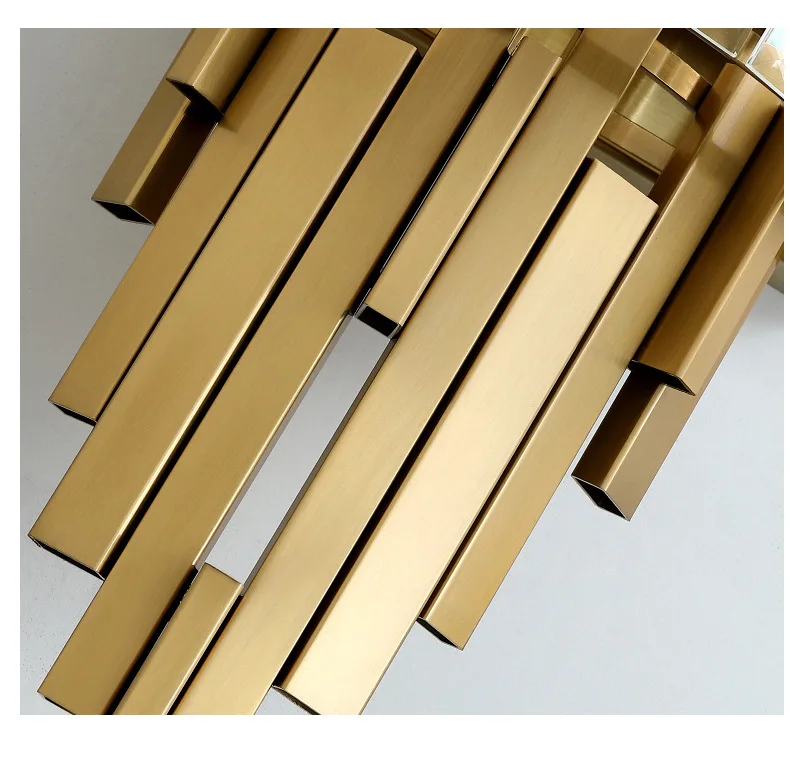 Close-up of a Luxury Geometric Wall Sconce featuring gold, rectangular bars arranged in a tiered Art Deco style design against a light background—ideal for elevating your home decor with elegance.