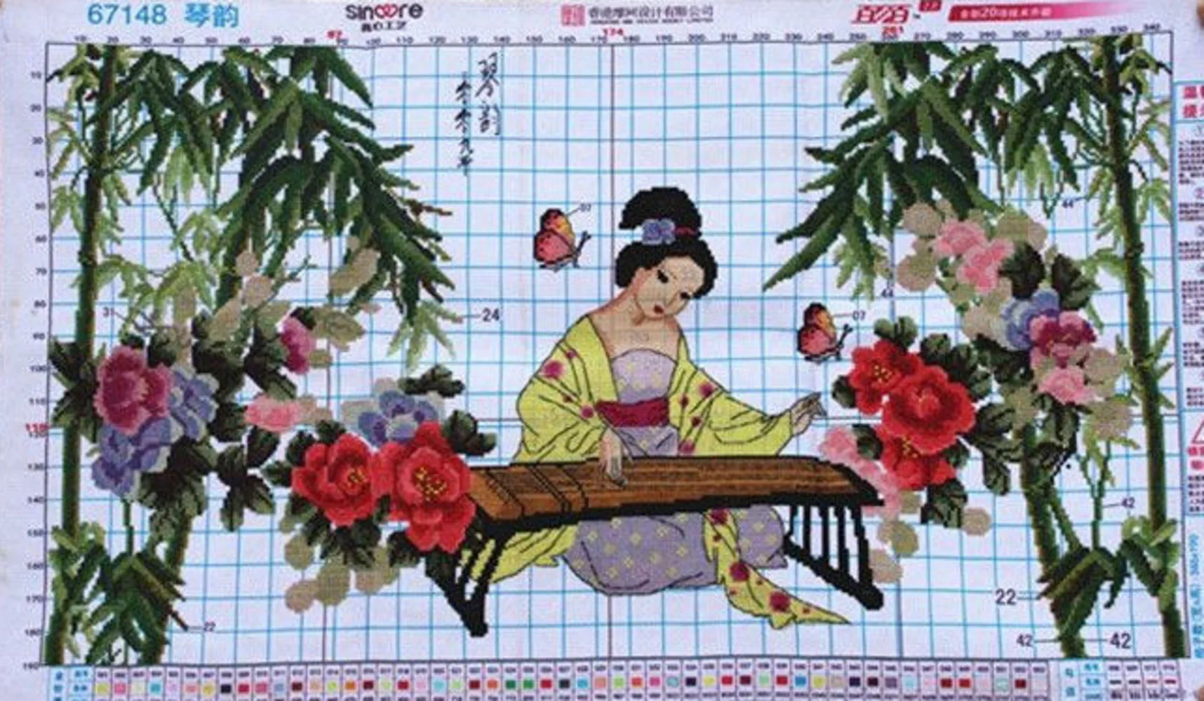 

Embroidered pure handmade cross stitch finished product with qin rhyme, national beauty, national color, and heavenly fragrance.